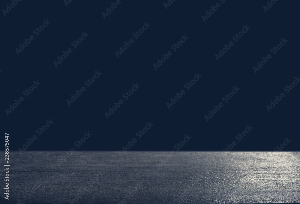 Dark background in front of empty stone concrete table for a celebration card, space for text modern look Dark background in front of empty stone concrete table for a celebration card, space for text modern look