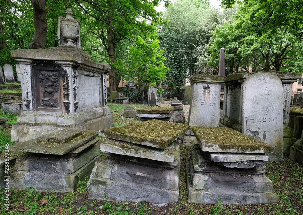 Tombstones at the historic Jewish cemetery at Brady Street, Whitechapel, East London UK.