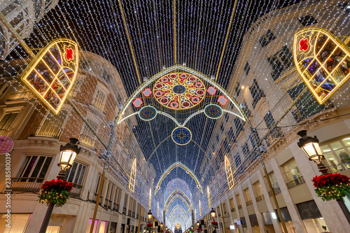 Christmas decorations on Calle Marques de Larios street in the centre of Malaga city, Andalusia, Spain. Most popular pedestrian street of Malaga