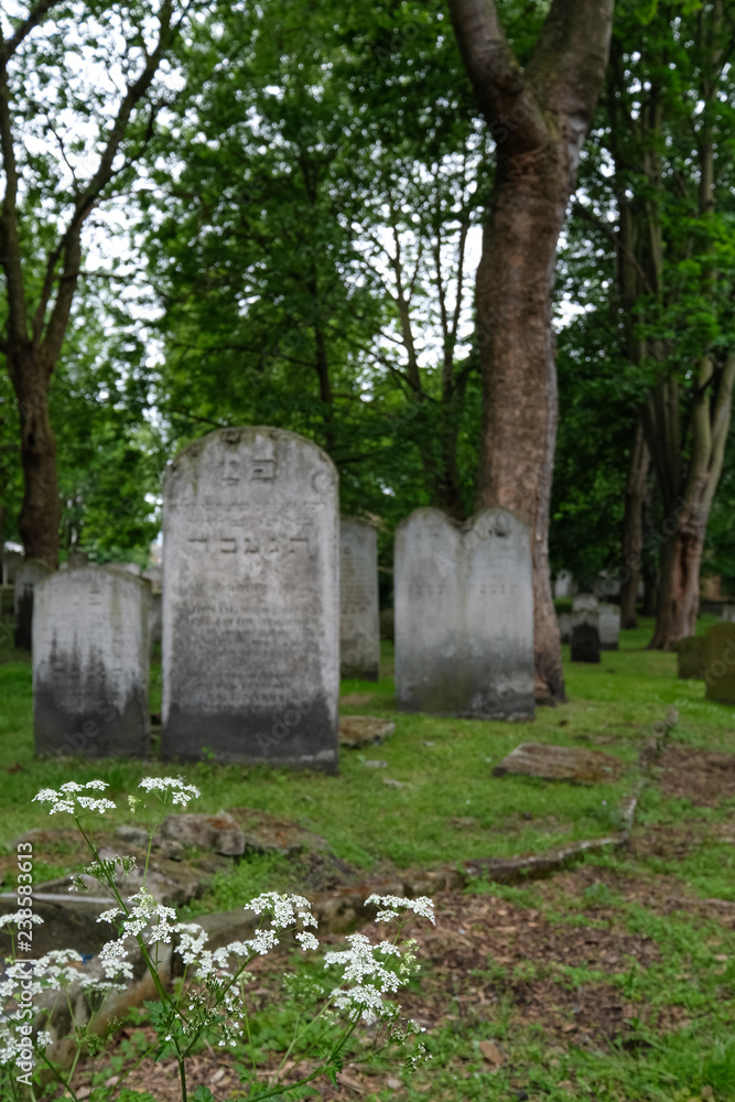 Tombstones at the historic Jewish cemetery at Brady Street, Whitechapel, East London UK.