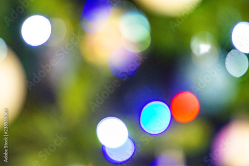 Blurred background with xmas bokeh effect of a Christmas Tree