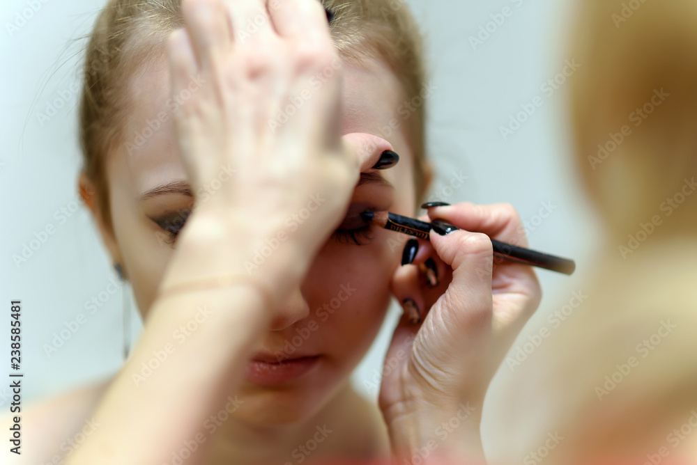 The concept of the work of the master makeup artist beautician. The concept of the work of the master makeup artist beautician.