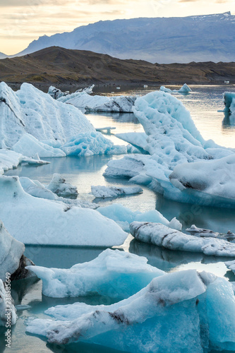 Canvas Print Eisbergs in glacier lagoon Jokulsarlon before sunset, Iceland
