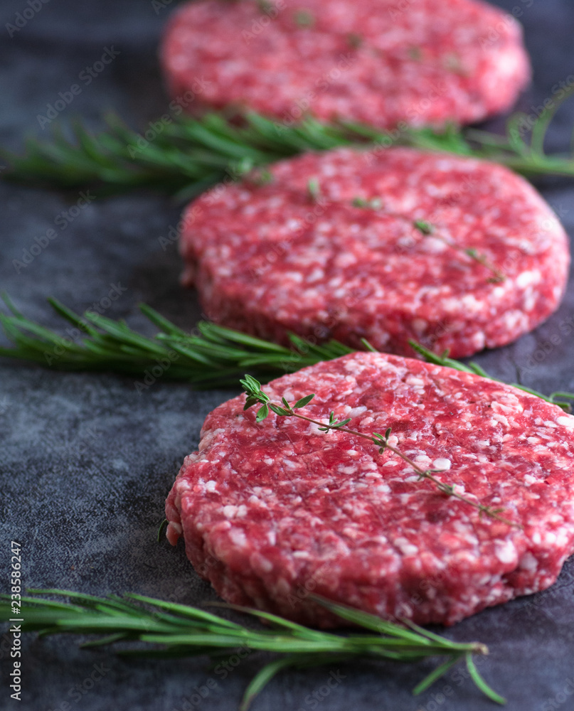 fresh meat beef. serving on a dark background fresh meat beef. serving on a dark background