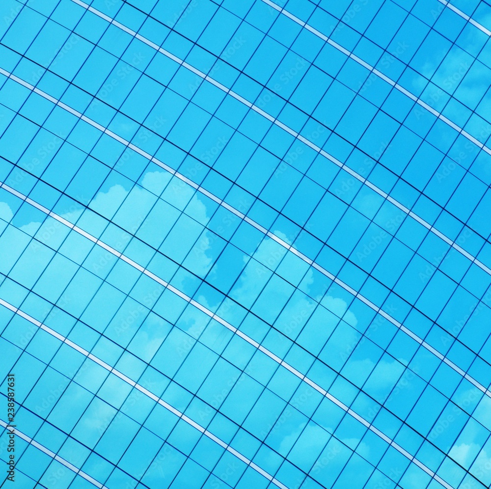 pattern of modern glass windows building skyscrapers of business center in the city pattern of modern glass windows building skyscrapers of business center in the city