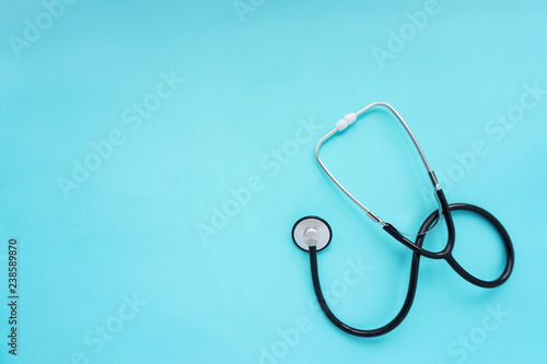 stethoscope for doctor checkup on health medical laboratory table background with space for text