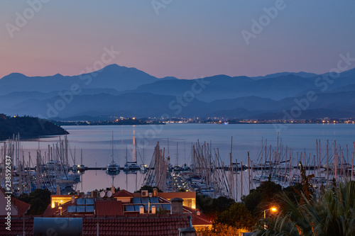 Beautiful bay and port of Fethiye during sunset photo