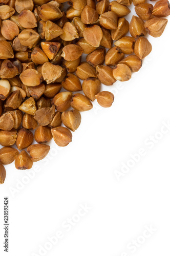 buckwheat or white background, macro. Buckwheat on a white background, macro. Buckwheat grain extreme closeup. Isolated on. 