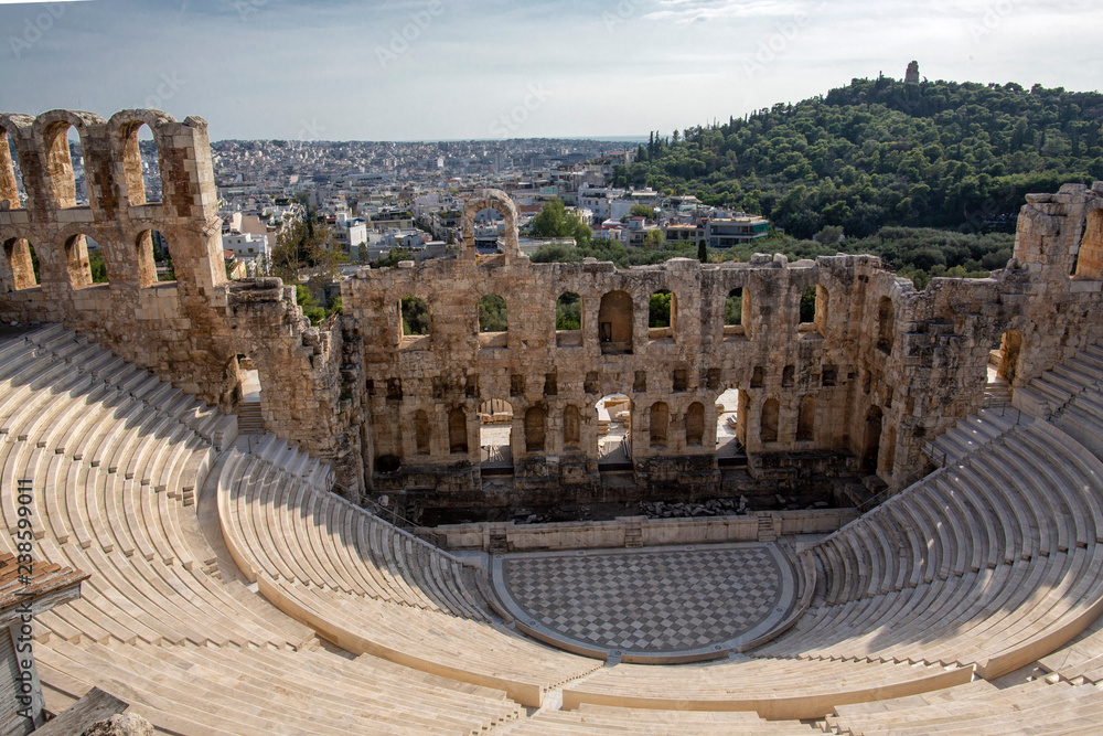 Ancient theatre of Herodes Atticus is a small building of ancient Greece used for public performances of music and poetry, below on the Acropolis . Herodus Atticus theater at Athens, Greece