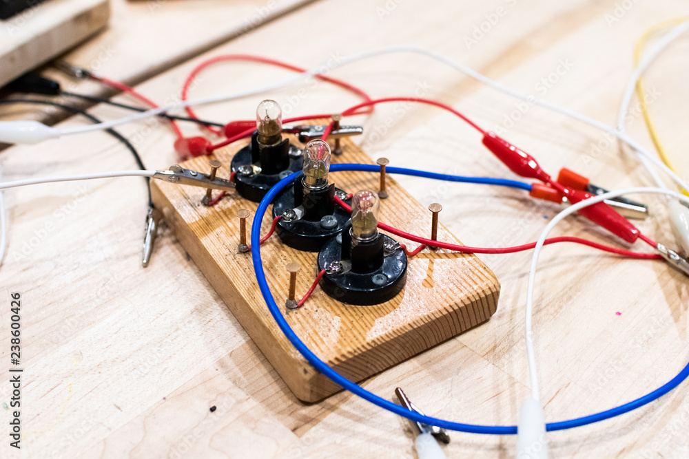 electric circuits in low voltage children, mounted on wooden bases with