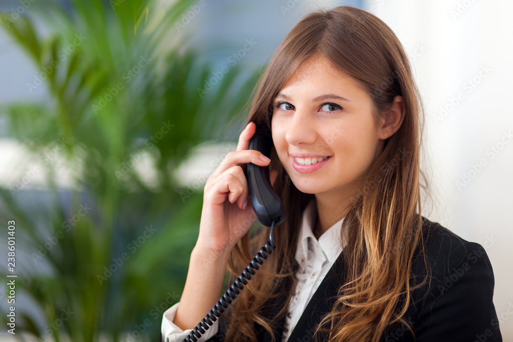 Smiling businesswoman on the phone Smiling businesswoman on the phone
