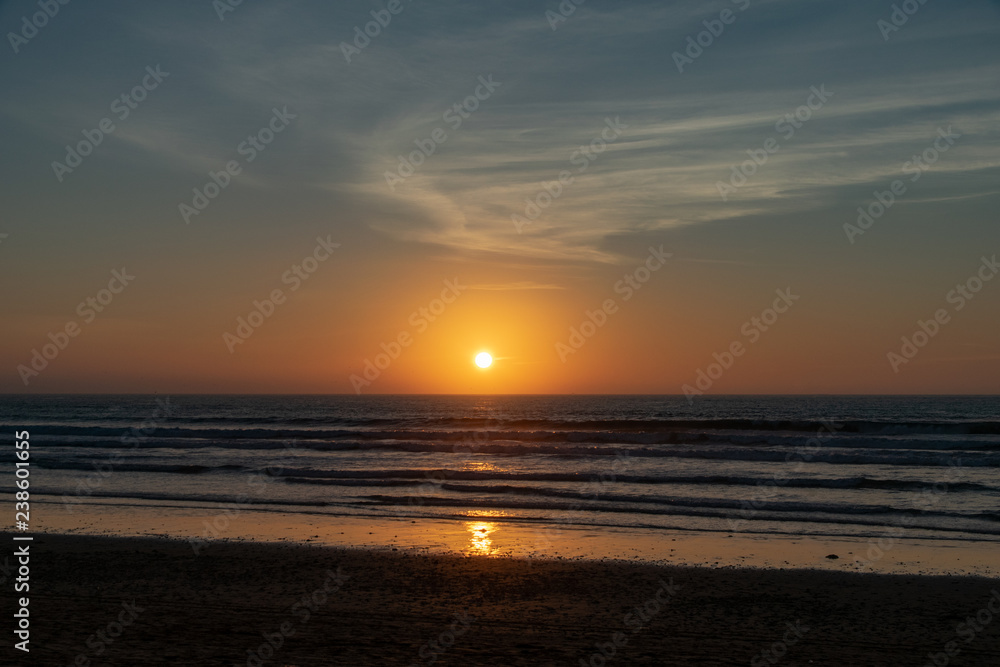 No people with a golden sunset over the Atlantic Ocean from Agadir Beach, Morocco, Africa