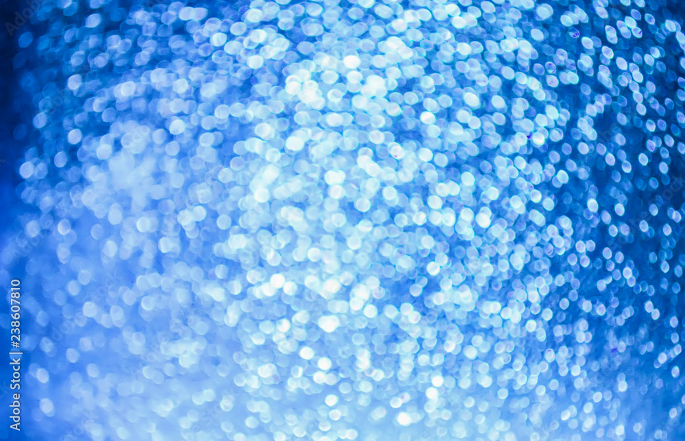 Obraz premium Glitter paper background. Festive sparkle texture. Decorative element for party, birthday, New Year design