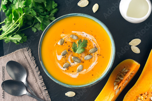 Fotografie Butternut squash or pumpkin soup in a bowl