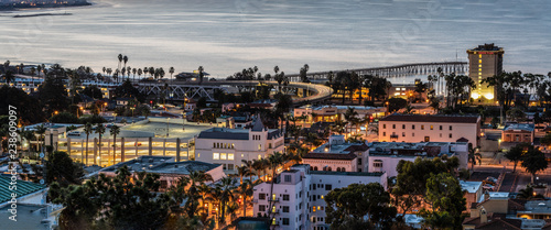 Sleepy town of Ventura nestled against the Pacific ocean just beginning to wake up to the morning lights of dawn. photo