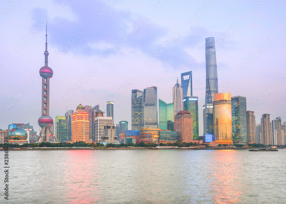 Illuminated Shanghai skyline at twilight