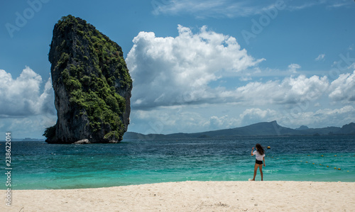 Teen girl standing on tropical beach in Thailand © David