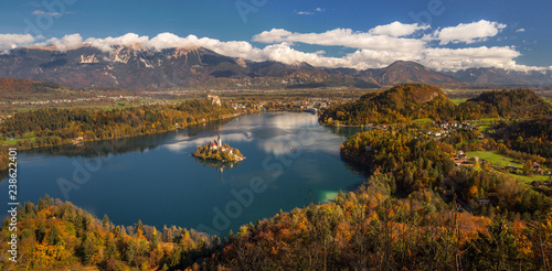 Bled lake with famous Pilgrimage Church of the Assumption of Maria and Alps at background, scenic landscape.