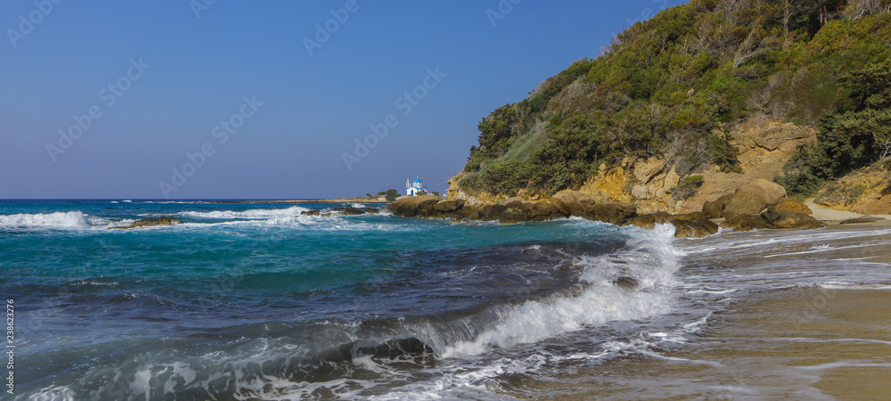 beautiful Messakti beach on the greek Island of Ikaria, Aegen Sea, Greece beautiful Messakti beach on the greek Island of Ikaria, Aegen Sea, Greece