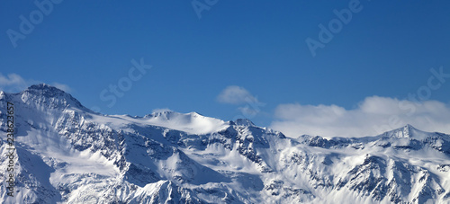 Panoramic view on snowy sunlight mountains and glacier in nice sunny evening © BSANI