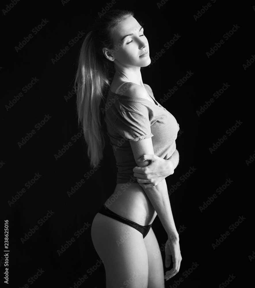 Young sexy girl posing at underwear black and white Stock Photo Adobe Stock photo