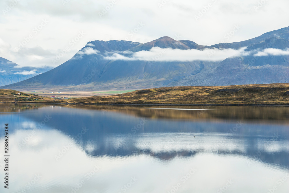 Water reflection on silent lake in Iceland