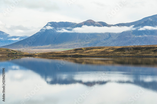 Water reflection on silent lake in Iceland © picturist