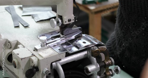  Craftsman making new shoes at his workshop. Technology, machinery concept.4k