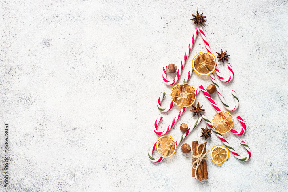 Creative christmas fir tree made from candy, spices and nuts Creative christmas fir tree made from candy, spices and nuts