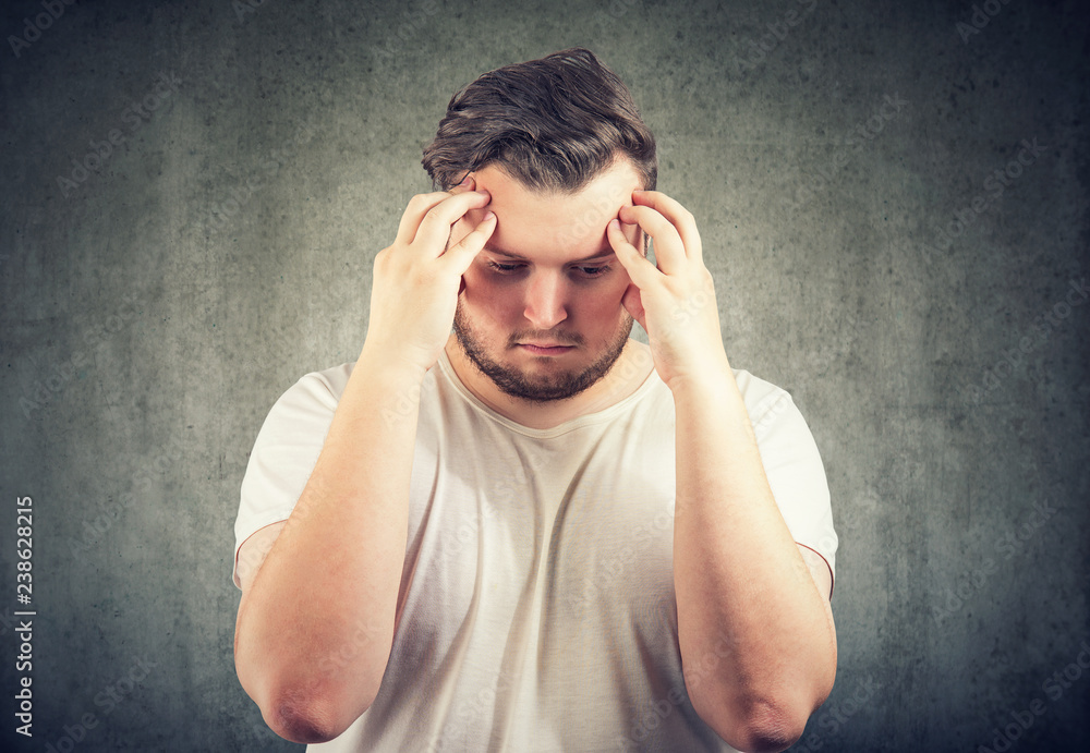 Depressed man contemplating in distress Depressed man contemplating in distress