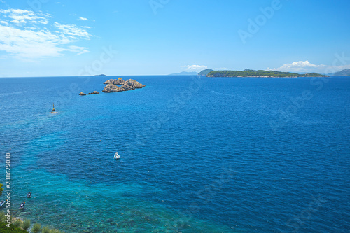 Aerial seascape view to turquoise waters of Adriatic Sea and islands the distance, near town Dubrovnik in Croatia. Famous sailing travel destination in Croatia, Dubrovnik summer scenery in Europe.
