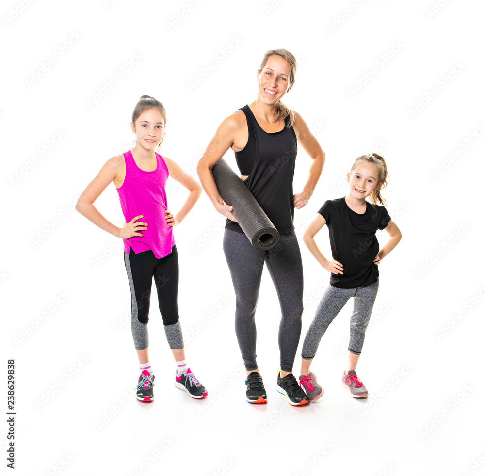 Obraz premium A Proud to be strong and healthy. Happy sporty family on studio white background