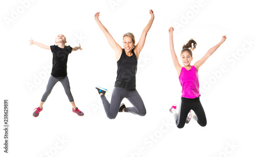 A Proud to be strong and healthy. Happy sporty family on studio white background