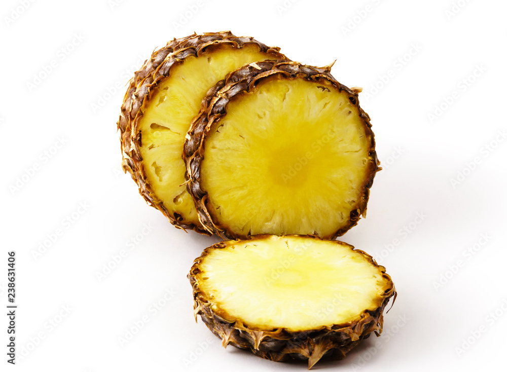 sliced ripe pineapple close up on white background sliced ripe pineapple close up on white background