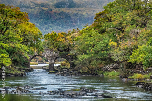 Canvastavla Old Weir Bridge, Meeting of the Waters, where the three Killarney lakes (Upper, Muckross and Lough Lane) meet Killarney National Park, County Kerry, Ireland
