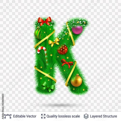 Holiday decorative letter of fir tree with toys. photo