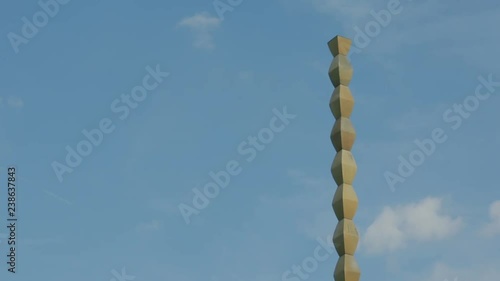 Timelapse footage of the Endless Column made by Constantin Brancusi symbolizes the Infinite Sacrifice of Romanian heroes of the First World War and it is considered the top point of the modern Art.  photo