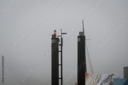 Port poles in Fog