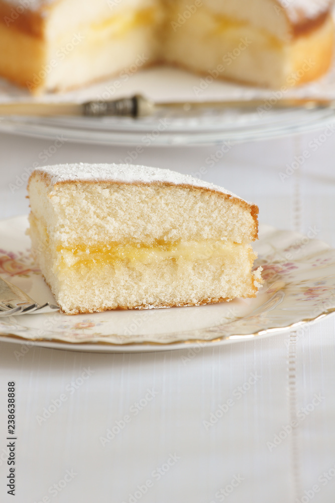 Sponge sandwich cake made with lemon curd and buttercream Sponge sandwich cake made with lemon curd and buttercream