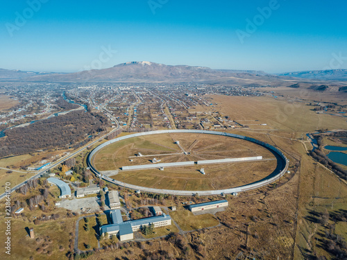 Aerial view from drone to big radio telescope RATAN-600 SAO RAS. Zelenchukskaya, Karachay-Cherkessia, Russia photo