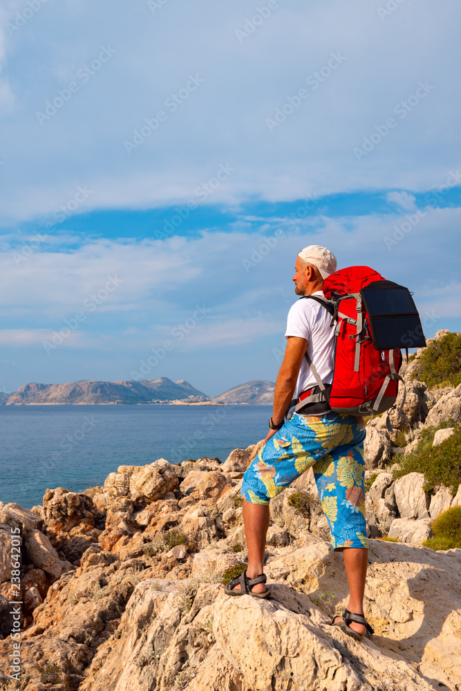 Fototapeta premium Alone traveler use portable solar panel