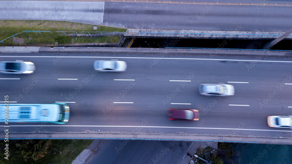 Aerial view of the street with cars passing on the avenue Aerial view of the street with cars passing on the avenue