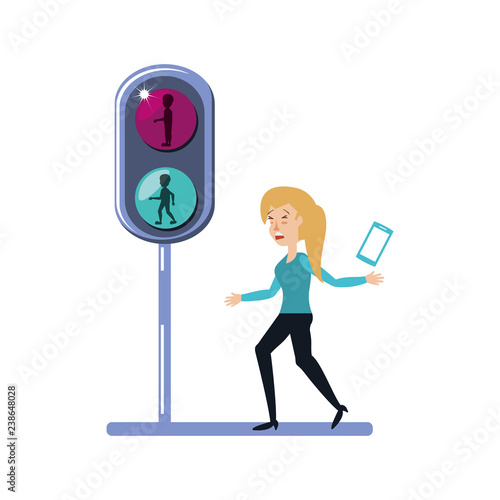woman with smartphone and traffic light