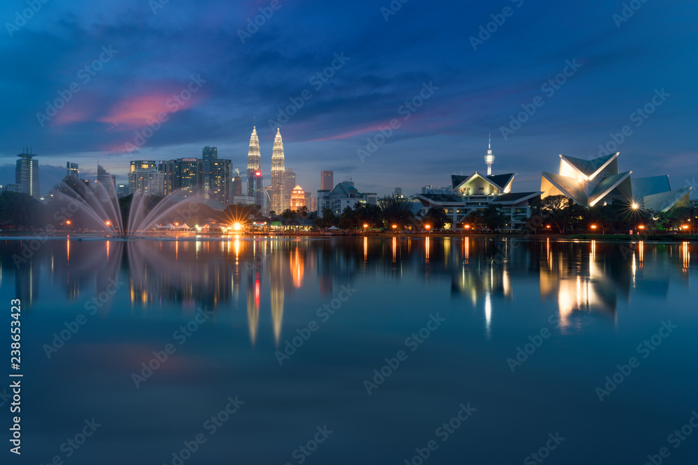 Kuala Lumpur Cityscape. image of Kuala Lumpur, Malaysia during sunset at Titiwangsa park with fountain.