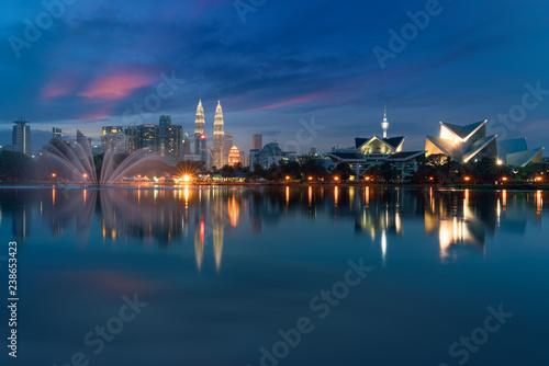 Kuala Lumpur Cityscape. image of Kuala Lumpur  Malaysia during sunset at Titiwangsa park with fountain.