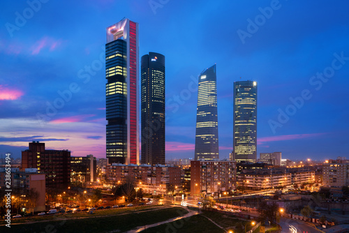 Madrid Four Towers financial district skyline at twilight in Madrid, Spain. photo