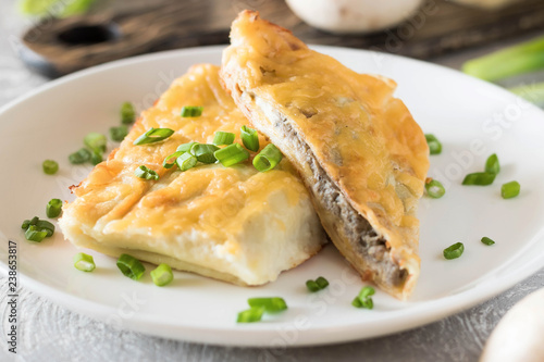 Béchamel baked pancakes stuffed with mushrooms