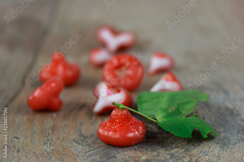 Fresh rose apple fruit isolate on wood 