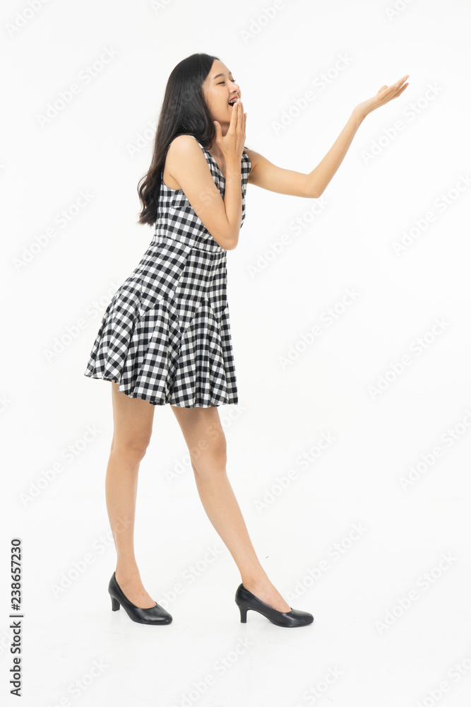 portrait of excited surprised attractive inspired girl jumping up isolated on background.Freedom legs stylish feet glamorous people teenager asian. portrait of excited surprised attractive inspired girl jumping up isolated on background.Freedom legs stylish feet glamorous people teenager asian.