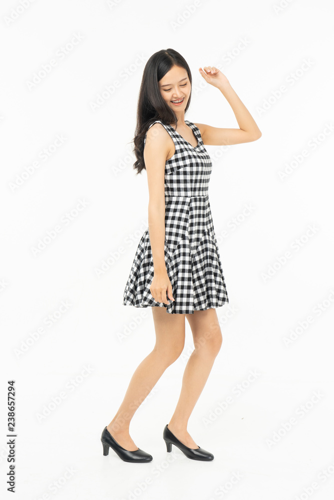 portrait of excited surprised attractive inspired girl jumping up isolated on background.Freedom legs stylish feet glamorous people teenager asian. portrait of excited surprised attractive inspired girl jumping up isolated on background.Freedom legs stylish feet glamorous people teenager asian.